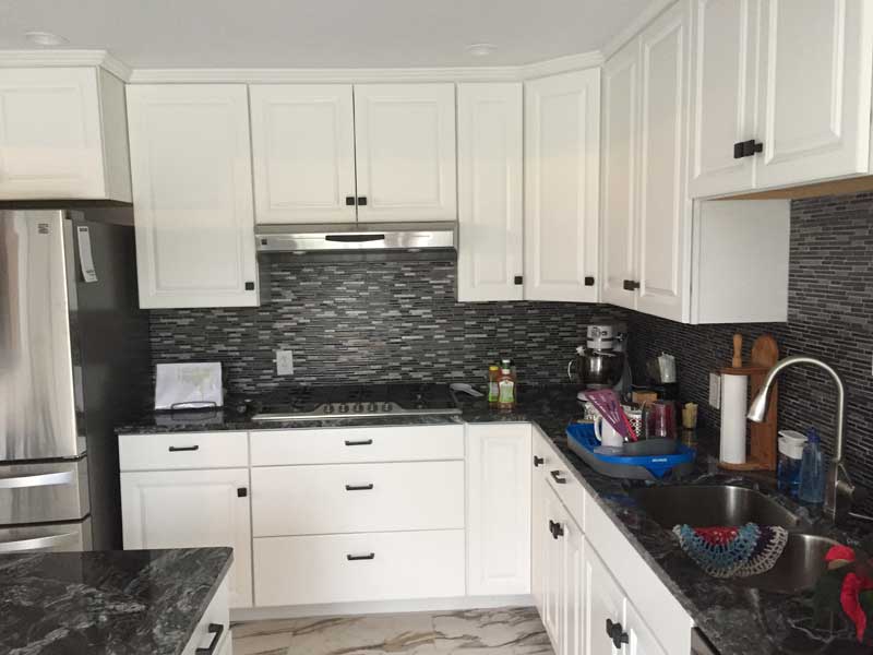 Basement Waterproofing gallery - parma cabinet refacing completed 0998