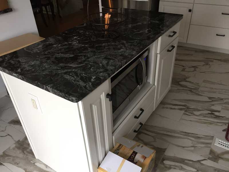 Basement Waterproofing gallery - parma cabinet refacing completed 1001